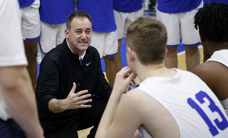 John Shulman talks to McCallie basketball players during a home game in the 2017-18 season, his last as head coach of the Blue Tornado. After winning 100 games in his four seasons as coach of the Blue Tornado, Shulman resigned. Now the former UTC coach is returning to the college ranks to head up the program at the University of Alabama in Huntsville.