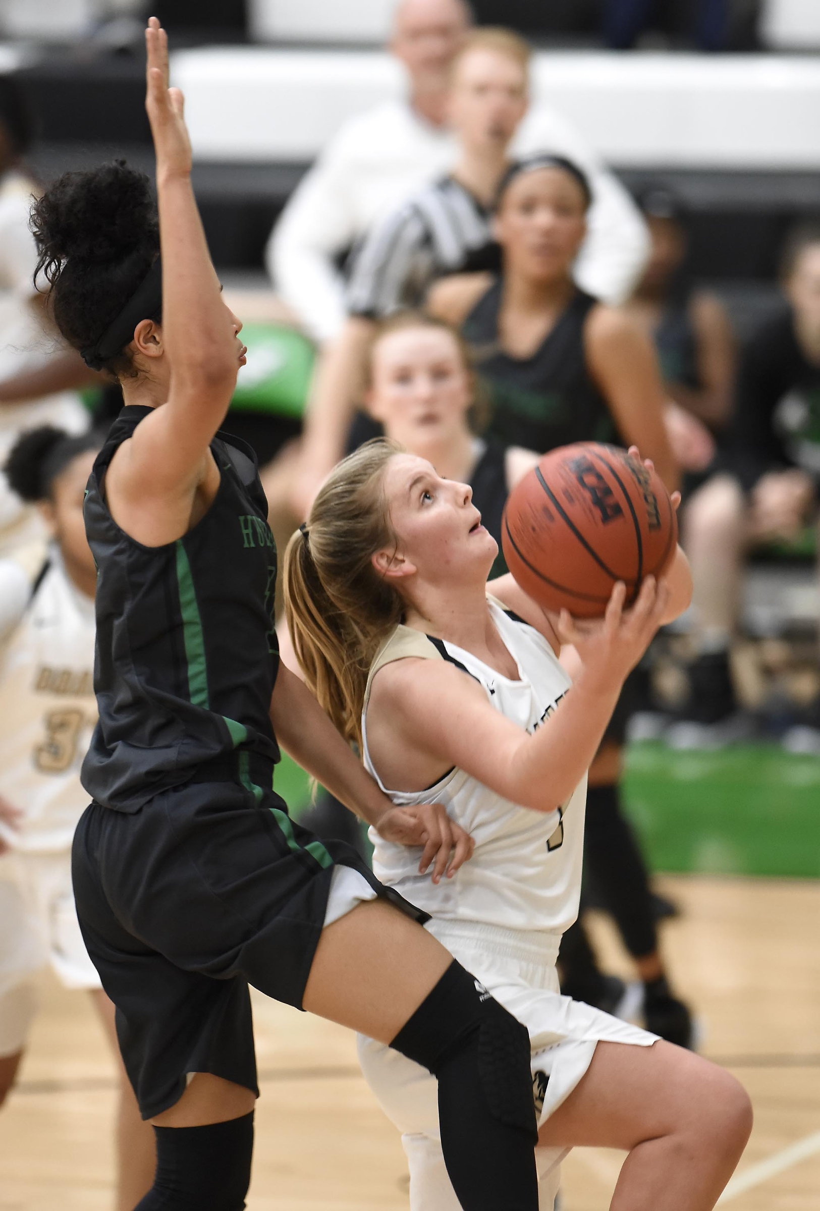 Bradley's Kaleigh Hughes (1) drives to the basket past East Hamilton's Madison Hayes (14).  The East Hamilton Lady Hurricanes met the Bradley Central Bears for the Region 3AAA TSSAA girls'  basketball championship on February 28, 2018