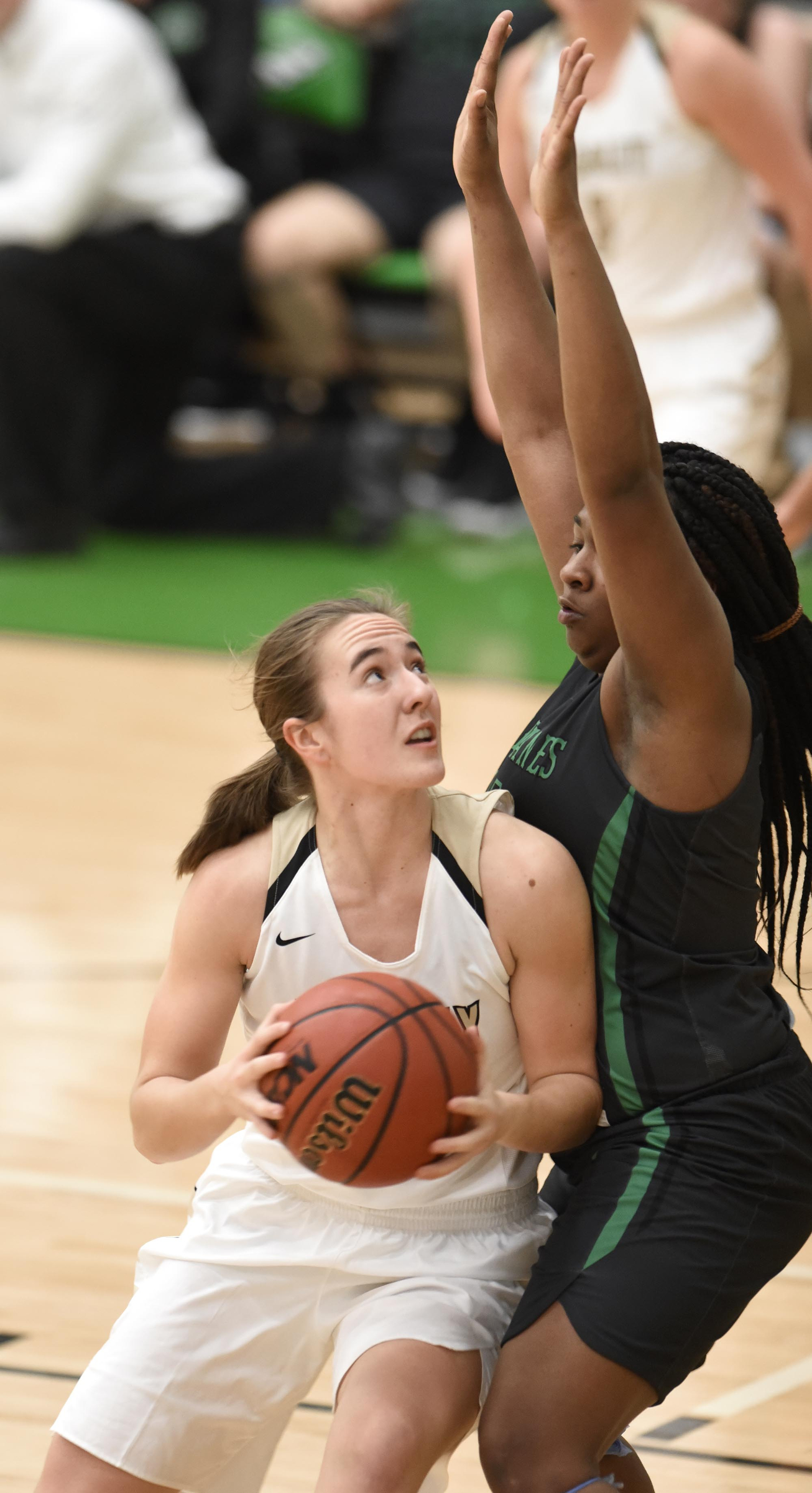Bradley's Hannah Lombard (45) looks to shoot while East Hamilton's Kaiyanna Suttles (11) defends.  The East Hamilton Lady Hurricanes met the Bradley Central Bears for the Region 3AAA TSSAA girls'  basketball championship on February 28, 2018