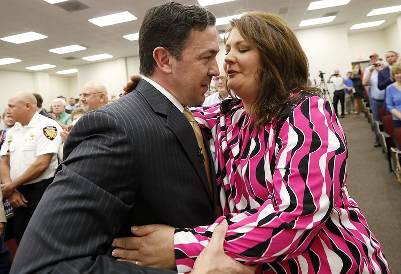 
              State Sen. Chris McDaniel, R-Ellisville, is greeted by his wife, Jill McDaniel, prior to announcing his candidacy to the U.S. Senate, Wednesday, Feb. 28, 2018 in Ellisville, Miss. McDaniel tried unsuccessfully to unseat U.S. Sen. Thad Cochran, R-Miss., in 2014. He will now challenge current Republican U.S. Sen. Roger Wicker. (AP Photo/Rogelio V. Solis)
            