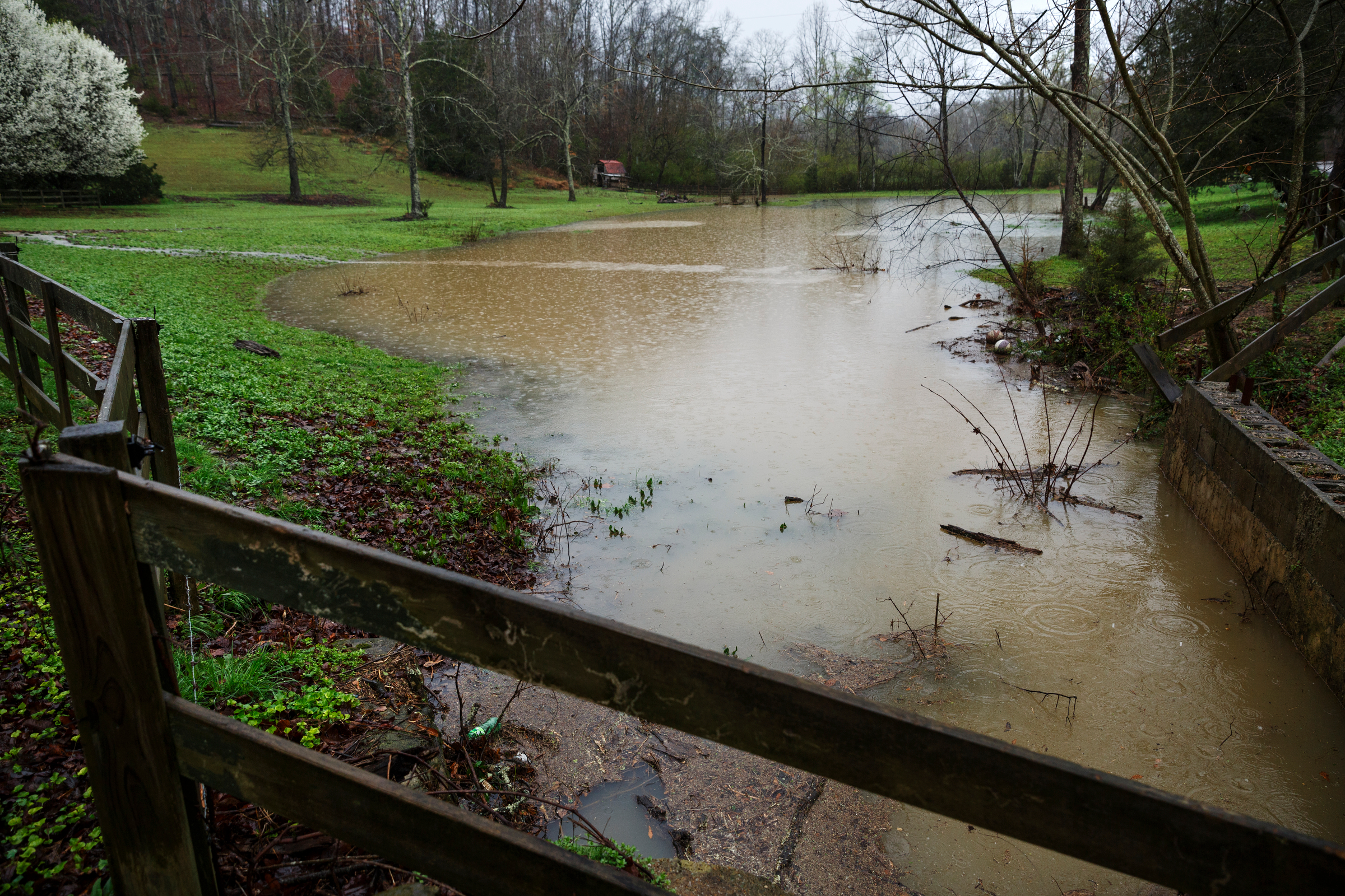 Floodwaters rise in a field by Creek Road after heavy rainfall caused flooding throughout the region Thursday, March 1, 2018, in Wildwood, Ga.