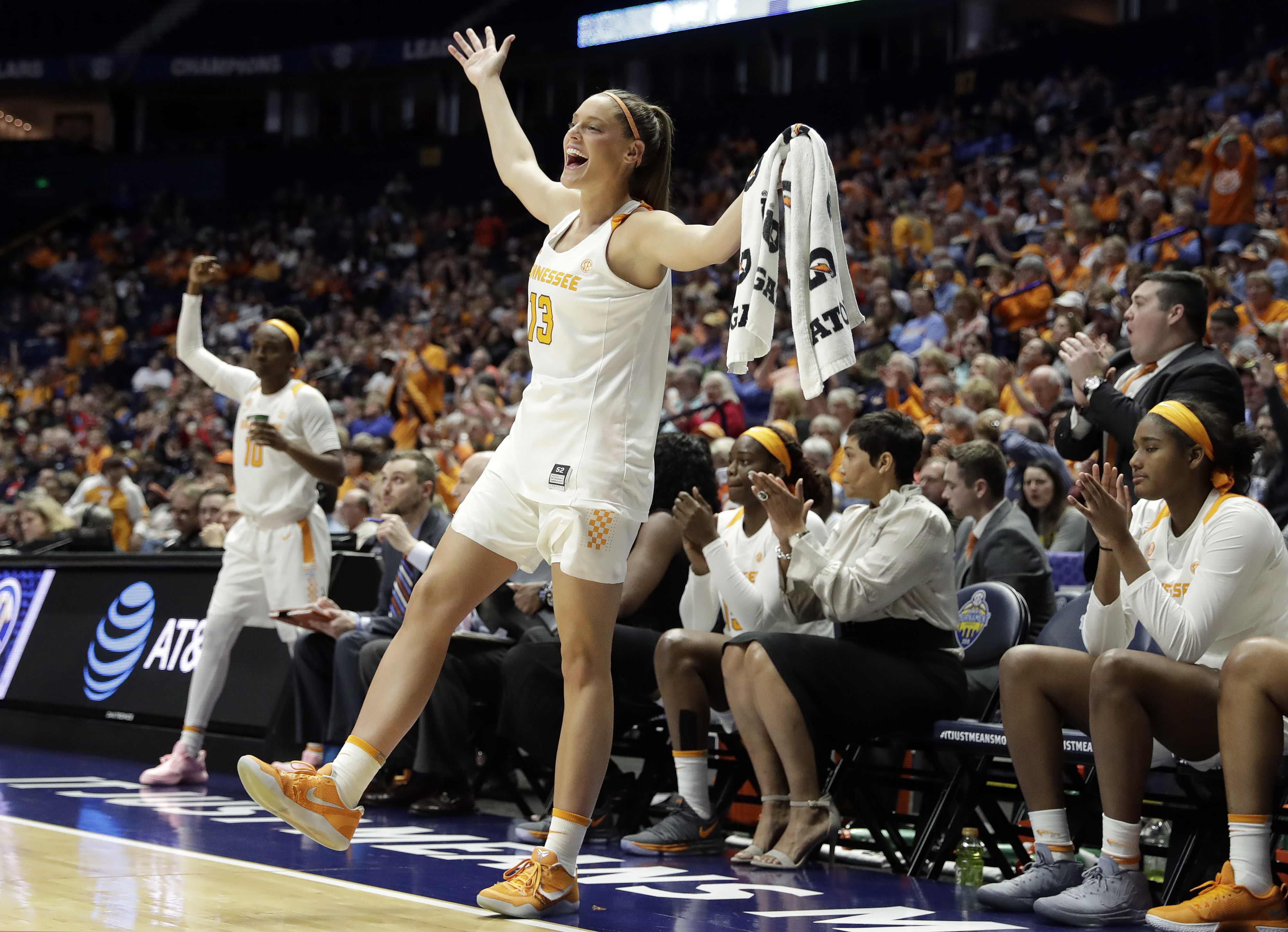 Tennessee forward Kortney Dunbar (13) cheers from the sideline after a score against Auburn in the second half of an NCAA college basketball game at the women's Southeastern Conference tournament Thursday, March 1, 2018, in Nashville, Tenn. (AP Photo/Mark Humphrey)