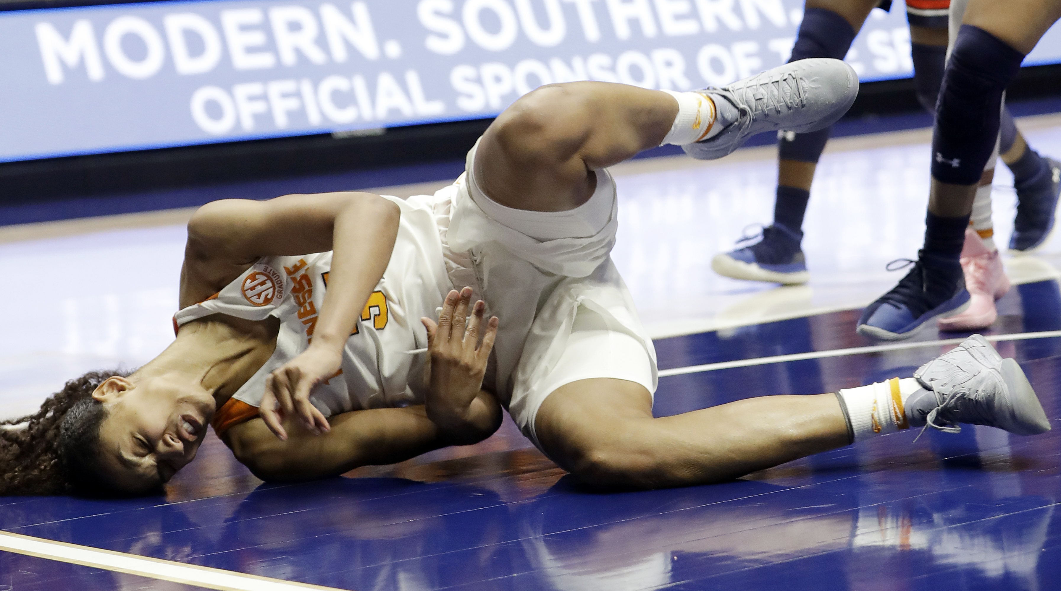 Tennessee's Jaime Nared falls to the court in the second half of an NCAA college basketball game against Auburn at the women's Southeastern Conference tournament Thursday, March 1, 2018, in Nashville, Tenn. (AP Photo/Mark Humphrey)