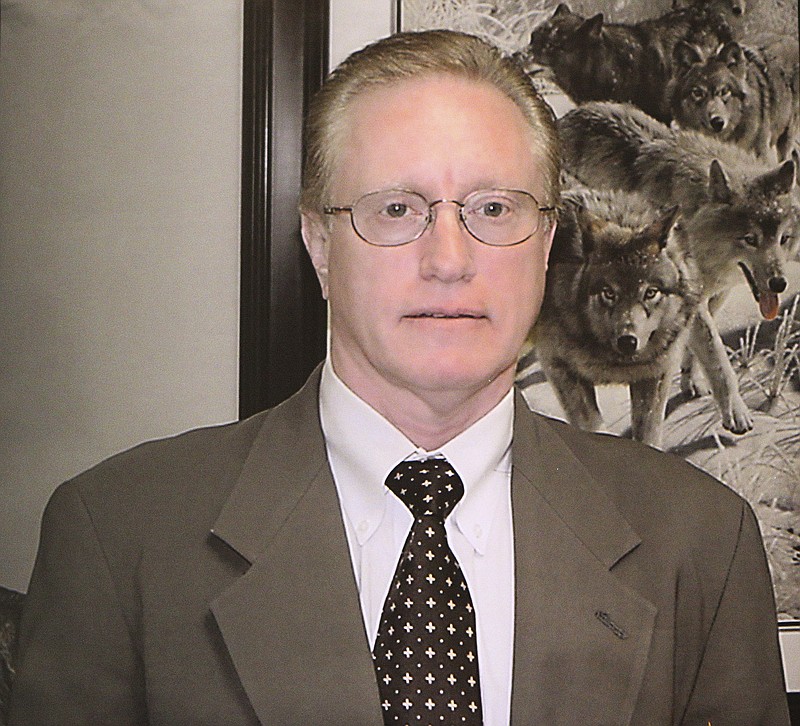 
              This is a copy of a displayed photograph showing Dr. Joseph L. Burton, who has been indicted along with seven other individuals by a federal grand jury on charges of illegal distribution of opioid painkillers and other drugs. The indictment was announced Thursday, March 1, 2018, by U.S. Attorney Byung J. "BJay" Pak and law enforcement officials at the Richard Russell Federal Courthouse, in Atlanta. (Curtis Compton/Atlanta Journal-Constitution via AP)
            