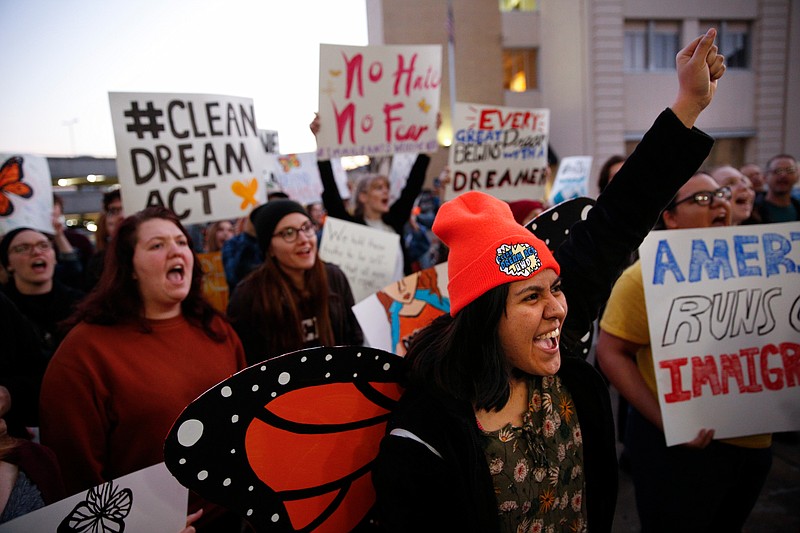 Staff photo by Doug Strickland / 
Areli Hernandez shouts with demonstrators at Chattanooga City Hall during the United We Dream march on Saturday, March 3, 2018, in Chattanooga, Tenn. Demonstrators marched to show support for an immigration solution that protects so-called dreamers, immigrants who have been protected by the Deferred Action for Childhood Arrivals program known as DACA.
