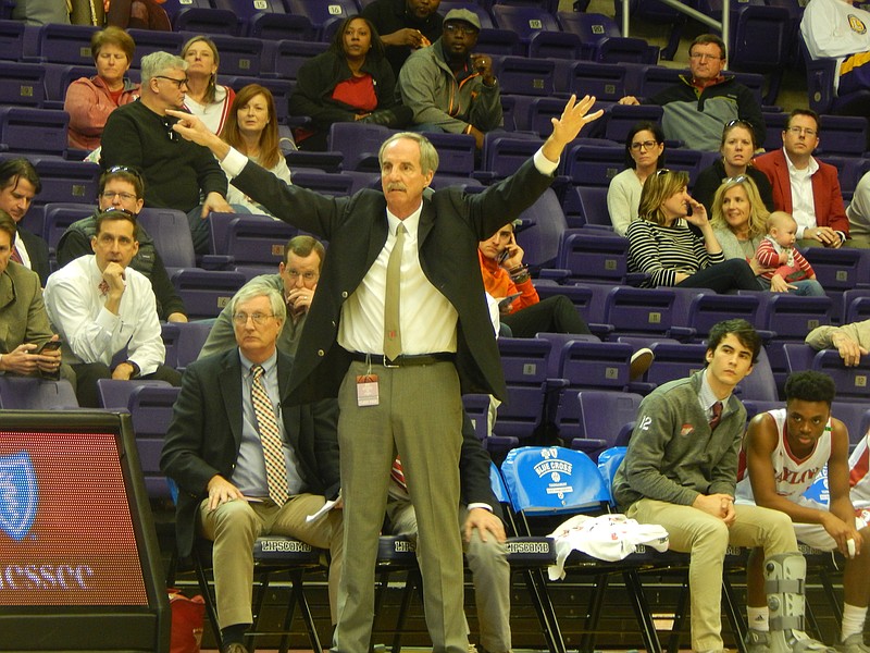 Baylor boys' basketball coach Austin Clark offers defensive instructions to his players during the second half of their TSSAA Division II-AA state semifinal at Lipscomb University in Nashville. The Red Raiders beat Briarcrest 45-44 on Friday and will play No. 1 Brentwood Academy tonight at 8:30 Eastern for the championship.