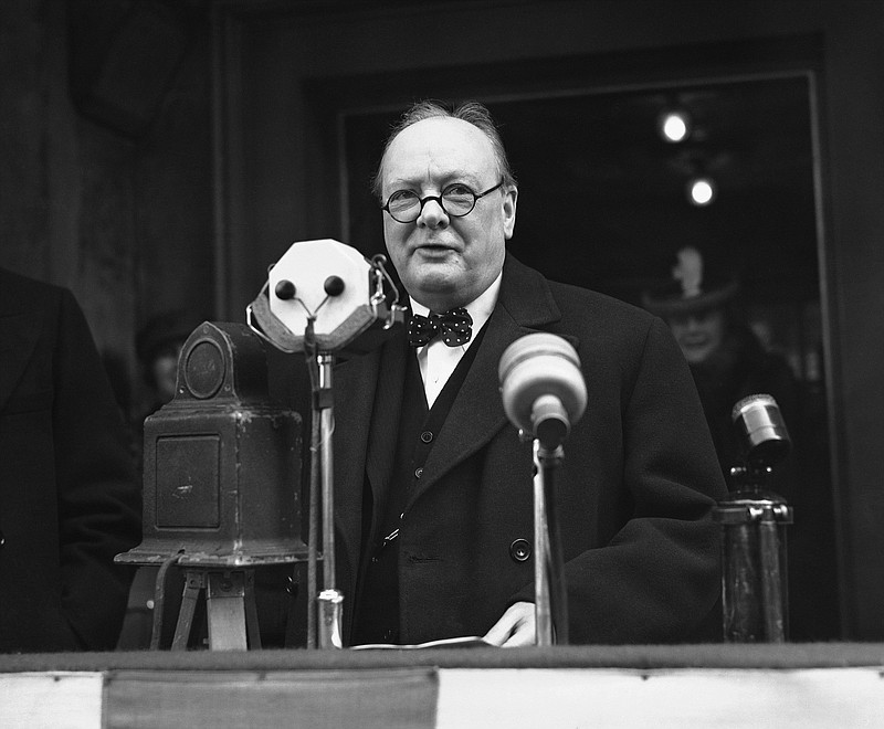Winston Churchill addressing the crowd outside The City of London Recruiting Centre for the Territorial Army at Mansion House, London, on April 24, 1939. (AP Photo/Staff/Putnam