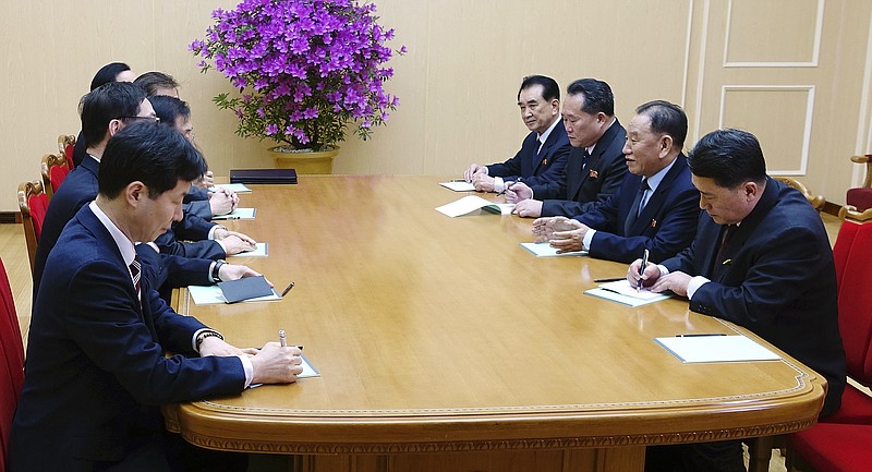 In this photo provided by South Korea Presidential Blue House via Yonhap News Agency, Kim Yong Chol, vice chairman of North Korea's ruling Workers' Party Central Committee, second from right, talks with South Korean delegation in Pyongyang, North Korea, Monday, March 5, 2018. Envoys for South Korean President Moon Jae-in, led by Moon's national security director, Chung Eui-yong, are on a rare two-day visit to Pyongyang that's expected to focus on how to ease a standoff over North Korea's nuclear ambitions and restart talks between Pyongyang and Washington. (South Korea Presidential Blue House/Yonhap via AP)