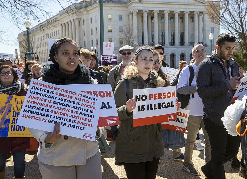 Deferred Action for Childhood Arrivals (DACA) recipients and other young immigrants march with supporters as they arrive at the Capitol in Washington, Monday, March 5, 2018. The program that temporarily shields hundreds of thousands of young people from deportation was scheduled to end Monday by order of President Donald Trump but court orders have forced the Trump administration to keep issuing renewals. (AP Photo/J. Scott Applewhite)