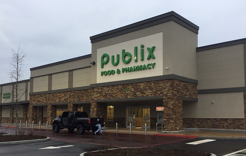 Workers prepare to open a new Publix supermarket next Wednesday, March 14, in the Village at Waterside. A new Aldi is scheduled to open at 670 Signal Mountain Road later this year. The two new locations will create nearly 140 new jobs.