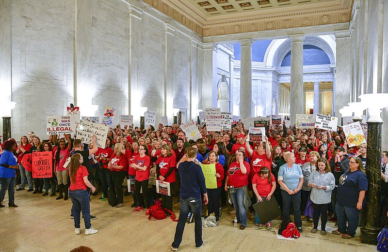 Teachers hold a rally outside the Senate Chambers in the West Virginia Capitol Monday, March. 5, 2018 in Charleston, W.V.