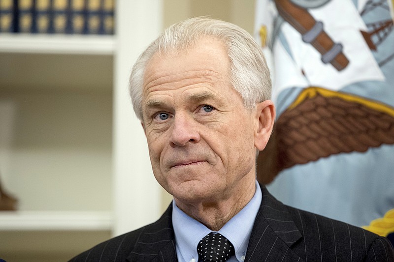 In this March 31, 2017, file photo, National Trade Council adviser Peter Navarro waits for President Donald Trump for an event in the Oval Office at the White House. Navarro signed on with the Trump campaign as a trade adviser, only to see his contrarian views marginalized when he arrived at the White House. Now Navarro and his protectionist trade policies are on the rise as his chief ideological rival, Gary Cohn, heads for the exit. (AP Photo/Andrew Harnik, File)