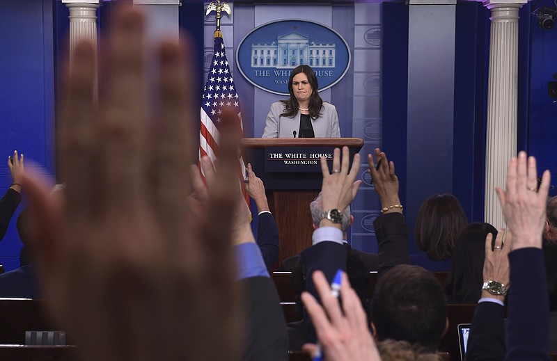 White House press secretary Sarah Huckabee Sanders listens to a reporter's question during the daily briefing at the White House in Washington, Wednesday, March 7, 2018. (AP Photo/Susan Walsh)