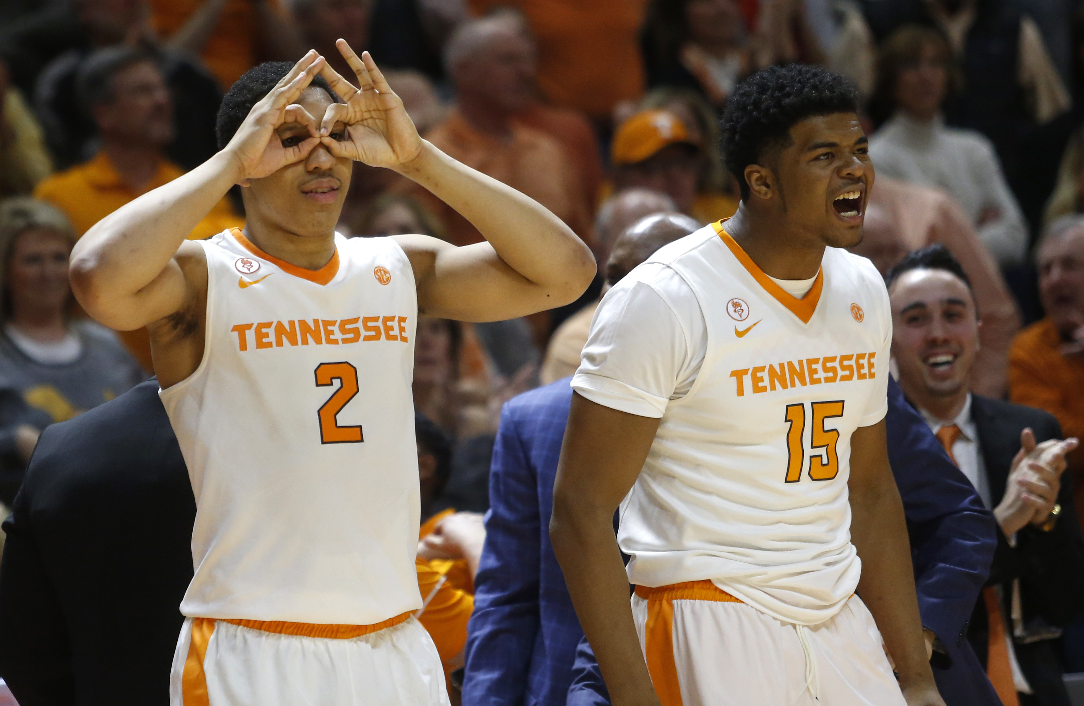 Tennessee forward Grant Williams (2) and forward Derrick Walker (15) react to a basket by a teammate in the second half of an NCAA college basketball game against Georgia on Saturday, March 3, 2018, in Knoxville, Tenn. (AP Photo/Crystal LoGiudice)