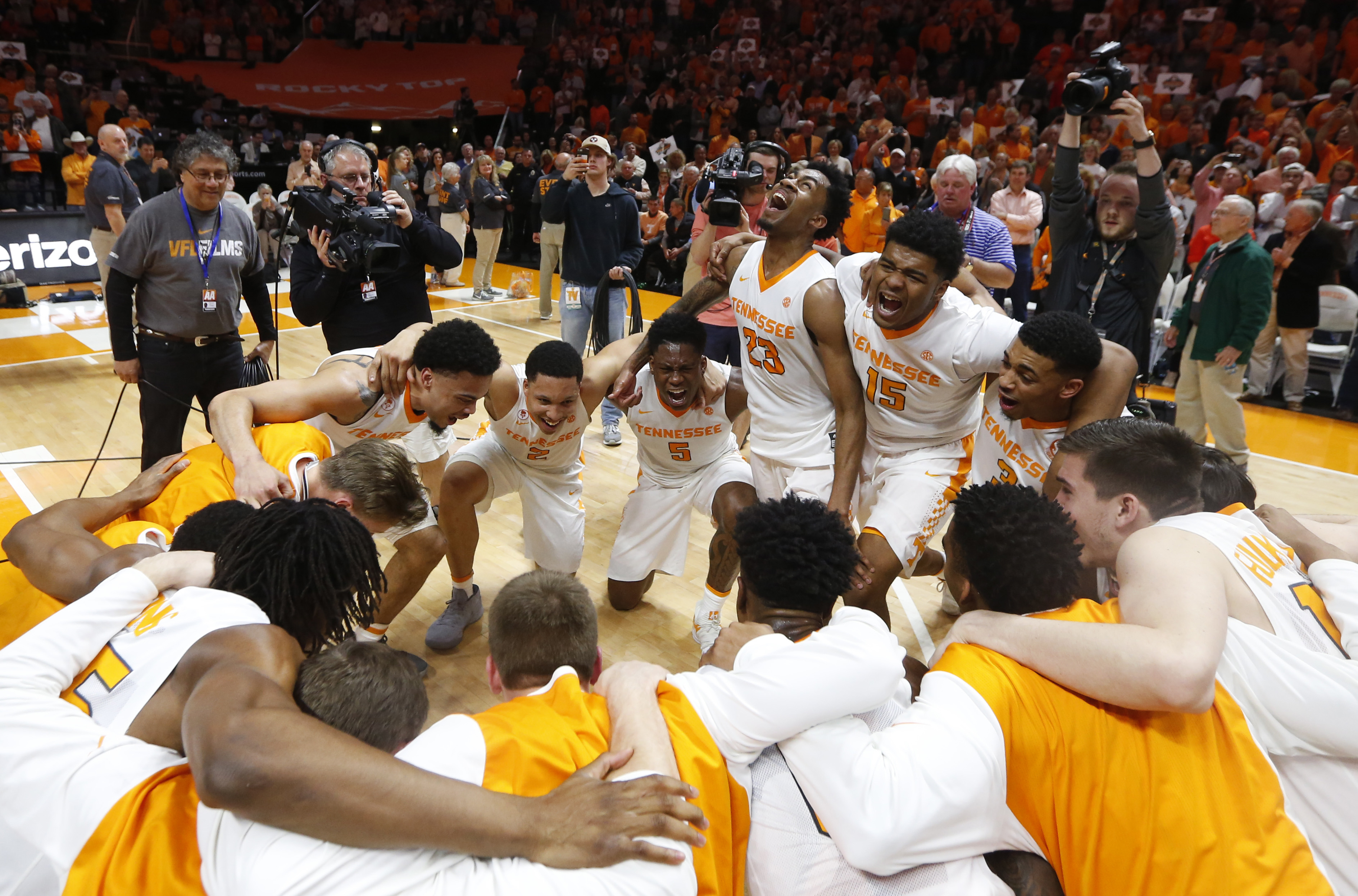 Tennessee celebrates defeating Georgia 66-61 for a share of the SEC Championship during an NCAA college basketball game Saturday, March 3, 2018, in Knoxville, Tenn. (AP Photo/Crystal LoGiudice)