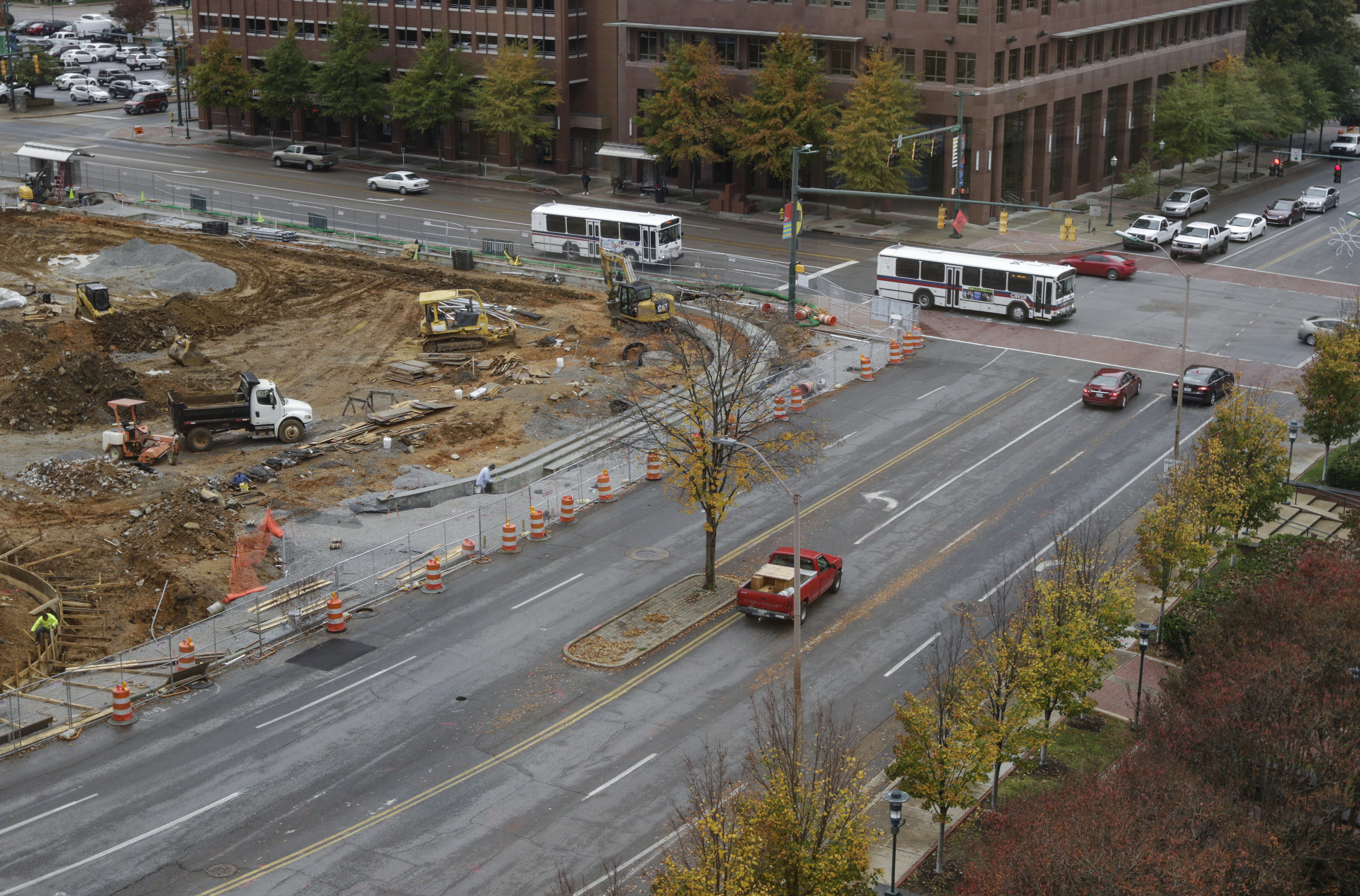 Traffic travels along a section of Martin Luther King Jr. Boulevard which runs adjacent to ongoing Miller Park construction Thursday, Nov. 9, 2017, in Chattanooga, Tenn. The stretch of road will be closed beginning Nov. 13 for approximately 100 days.