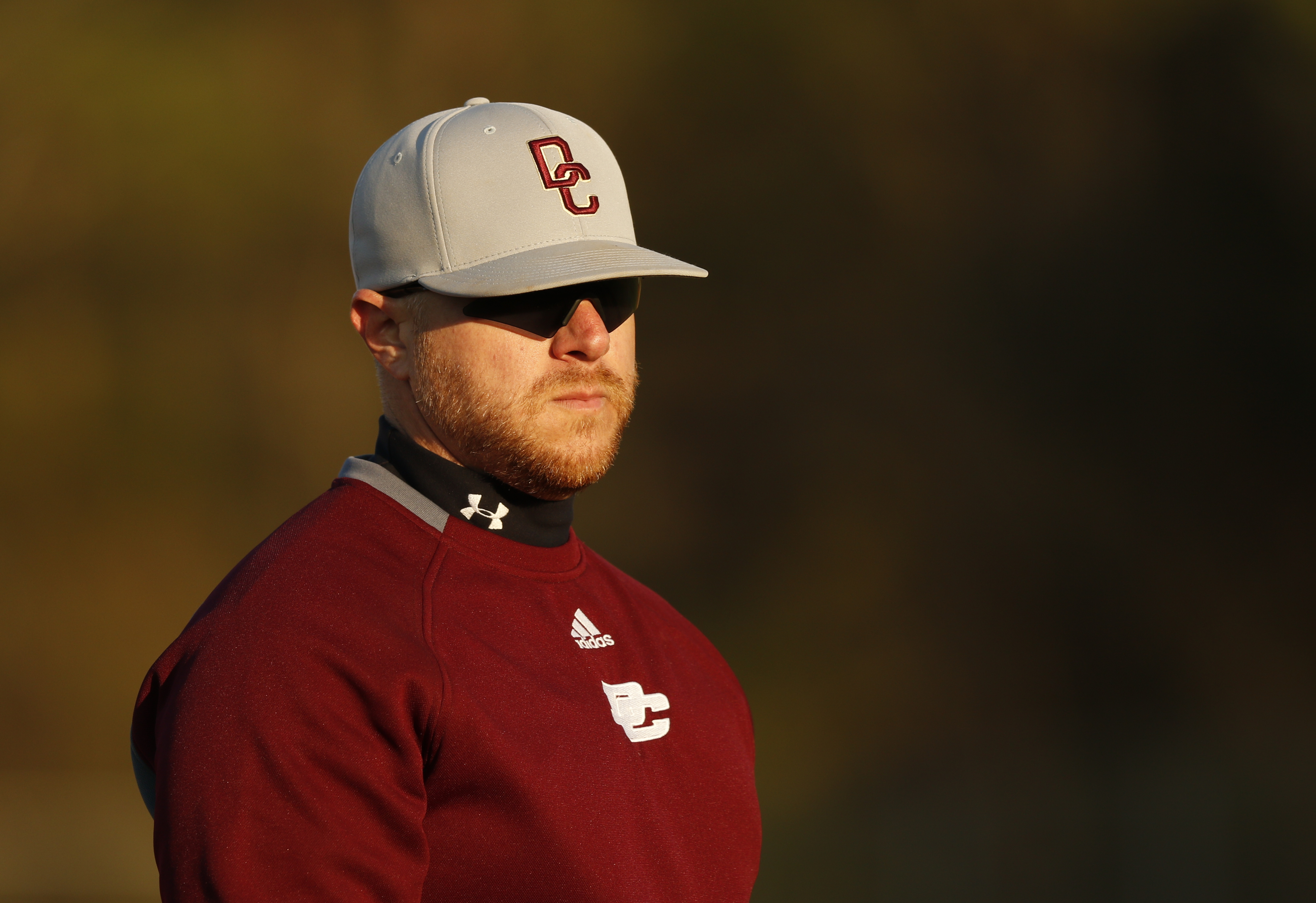Dade County baseball coach Aaron Simmons watches from 3rd base during their prep baseball game against LFO at Dade County High School on Thursday, March 8, 2018, in Trenton, Ga.