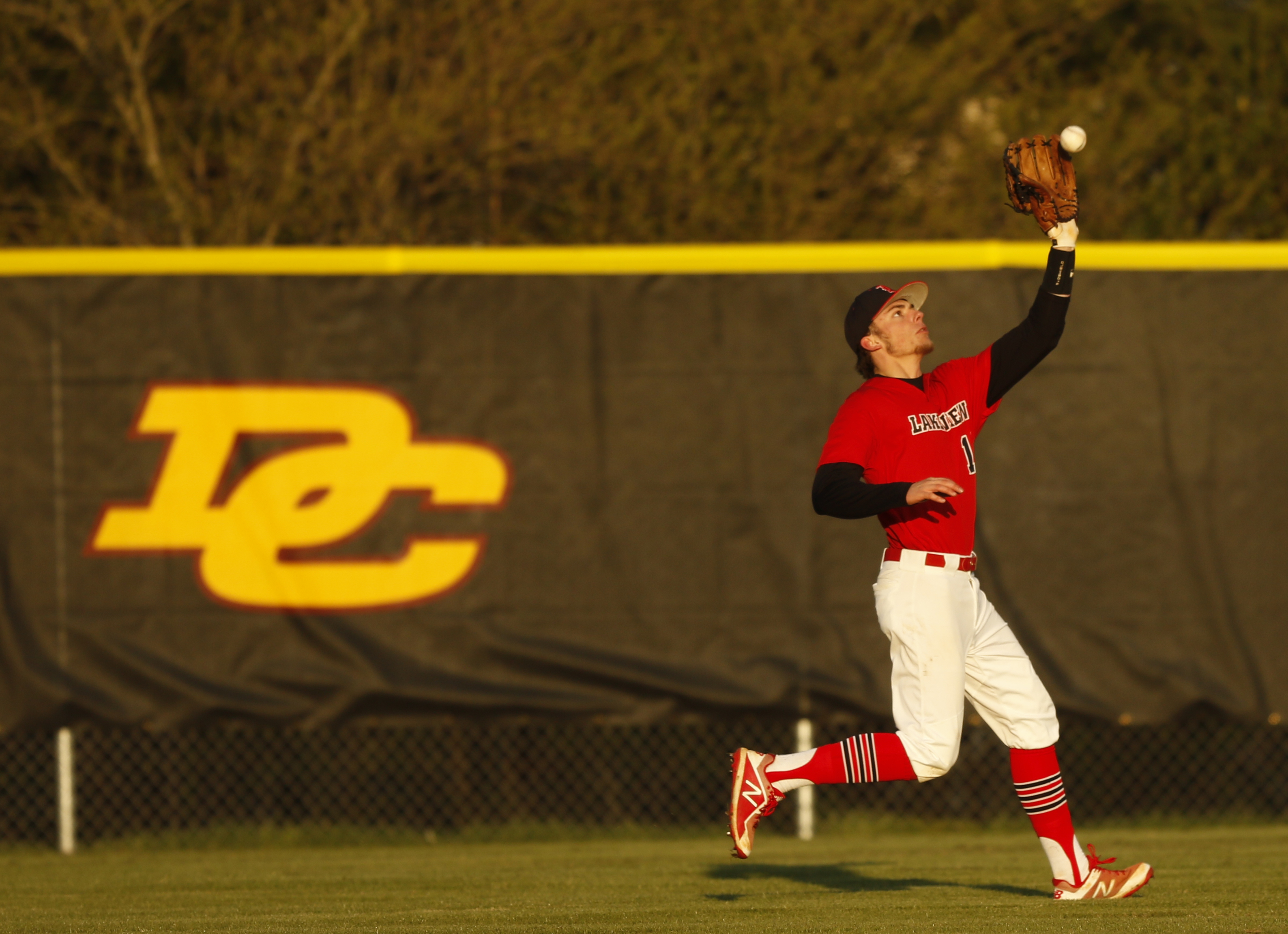 LFO center fielder Bryce Donnahoo fields a fly ball during their prep baseball game at Dade County High School on Thursday, March 8, 2018, in Trenton, Ga.