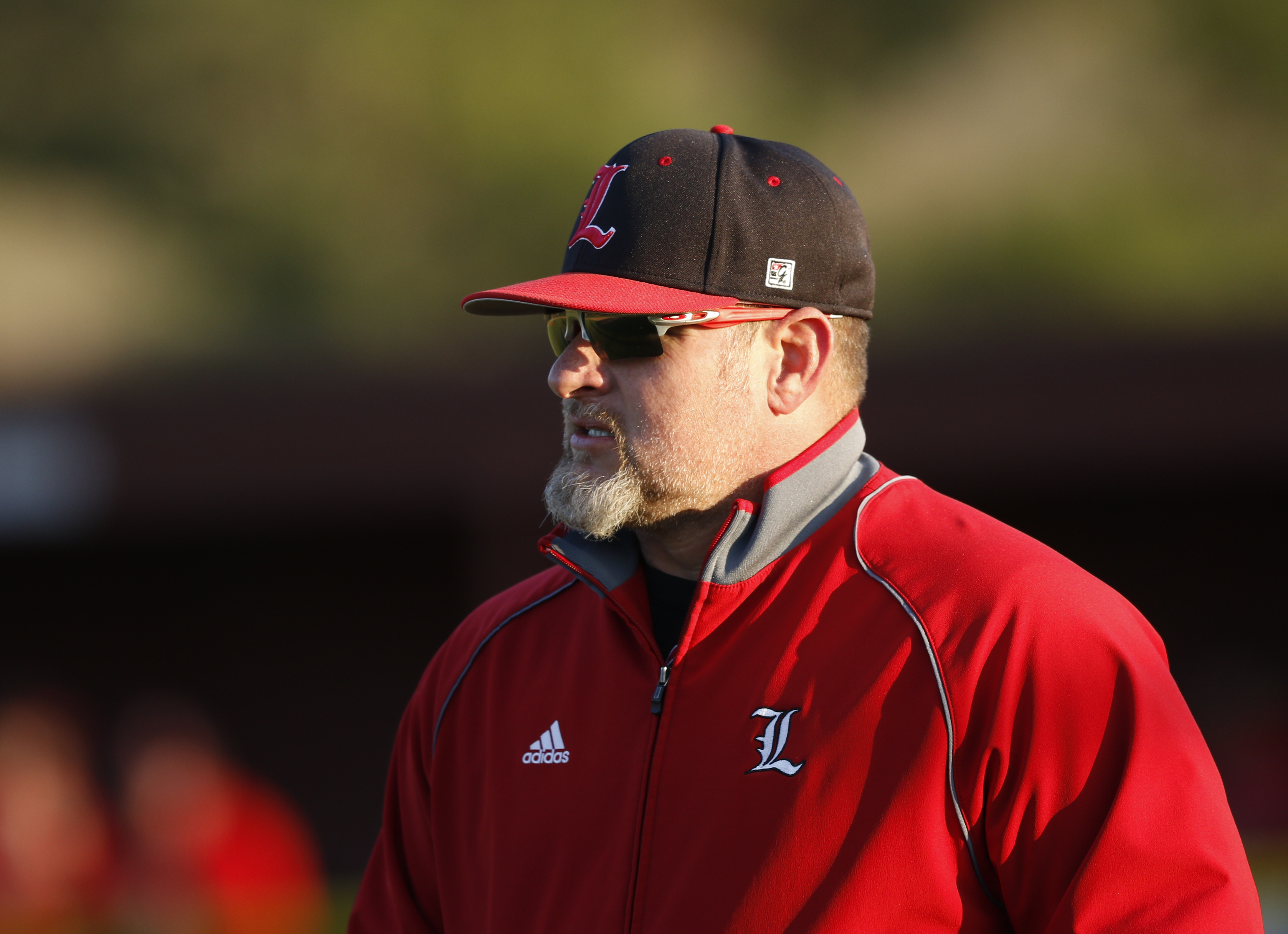 LFO baseball coach Johnny Burch watches from the 3rd base box during their prep baseball game at Dade County High School on Thursday, March 8, 2018, in Trenton, Ga.