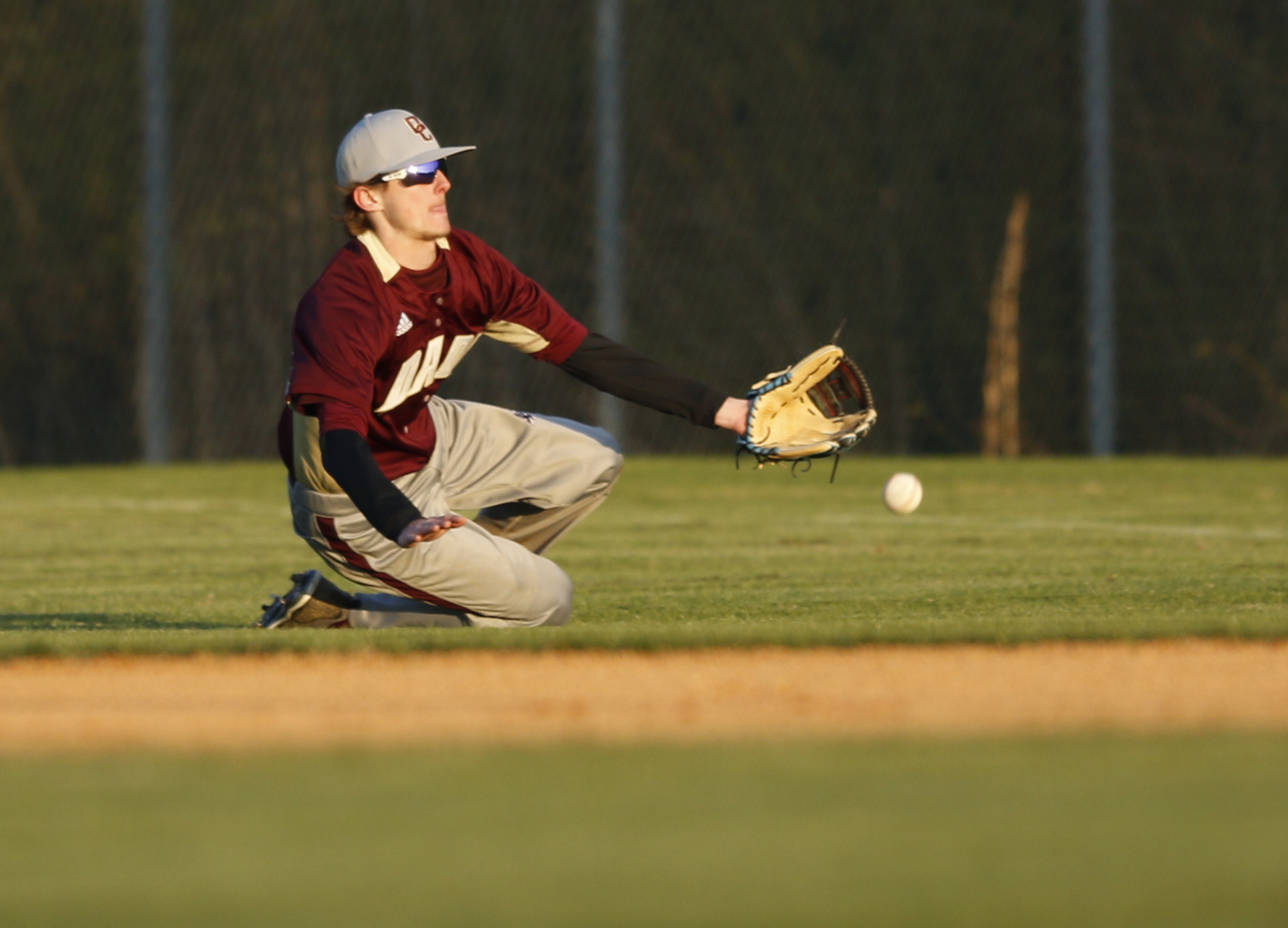 A fly ball lands ahead of Dade County right fielder Noah Bone during their prep baseball game at Dade County High School on Thursday, March 8, 2018, in Trenton, Ga.