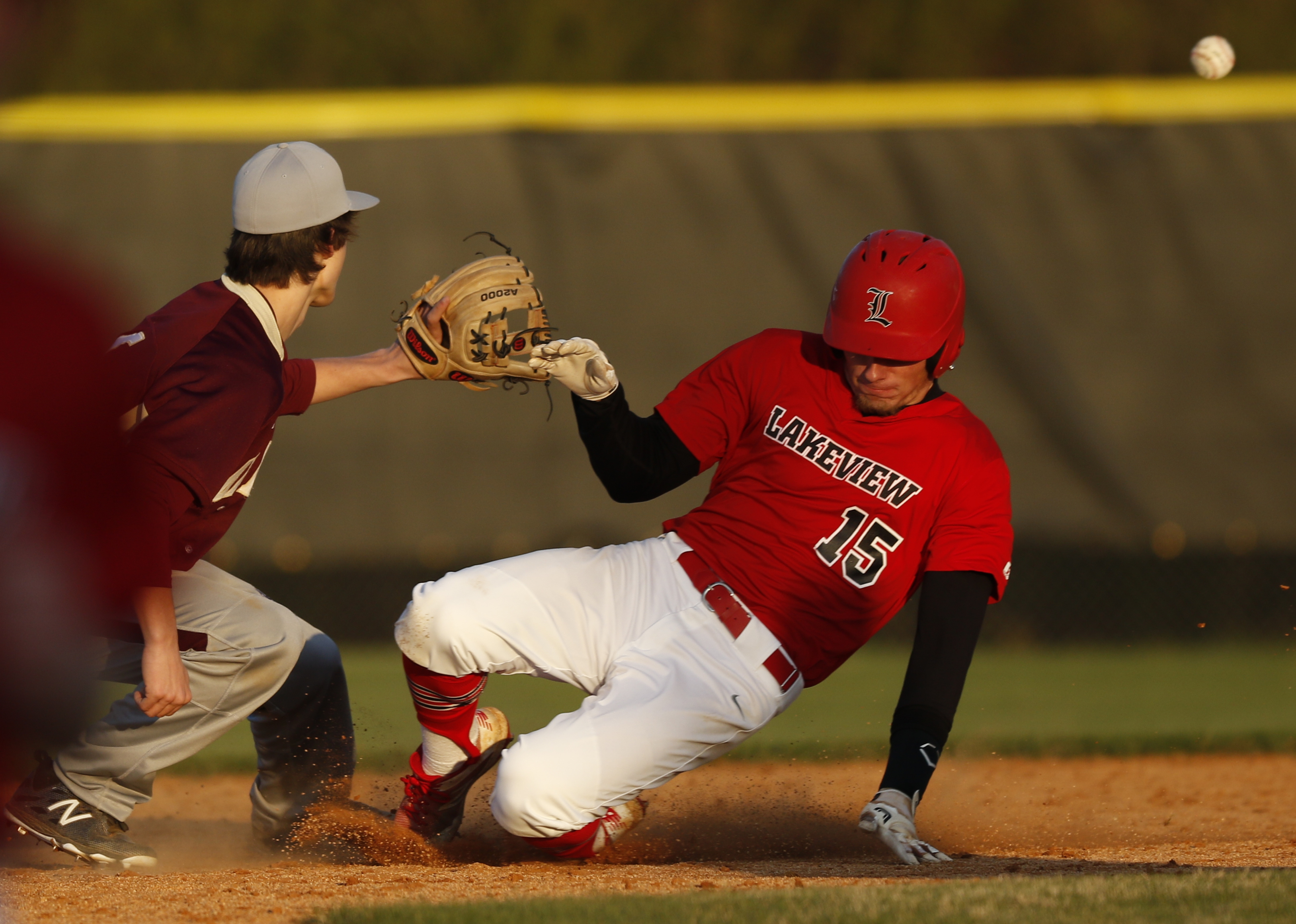 LFO runner Bryce Donnahoo beats the throw to 2nd and Dade County shortstop Seth Swader during their prep baseball game at Dade County High School on Thursday, March 8, 2018, in Trenton, Ga.