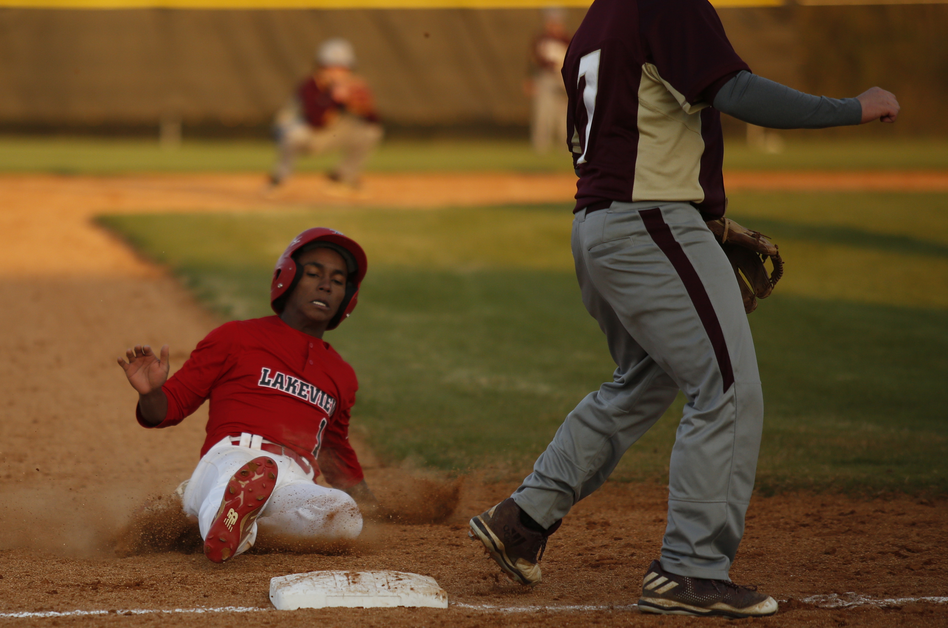 LFO runner Giovanni Barroso slides into 3rd during their prep baseball game at Dade County High School on Thursday, March 8, 2018, in Trenton, Ga.