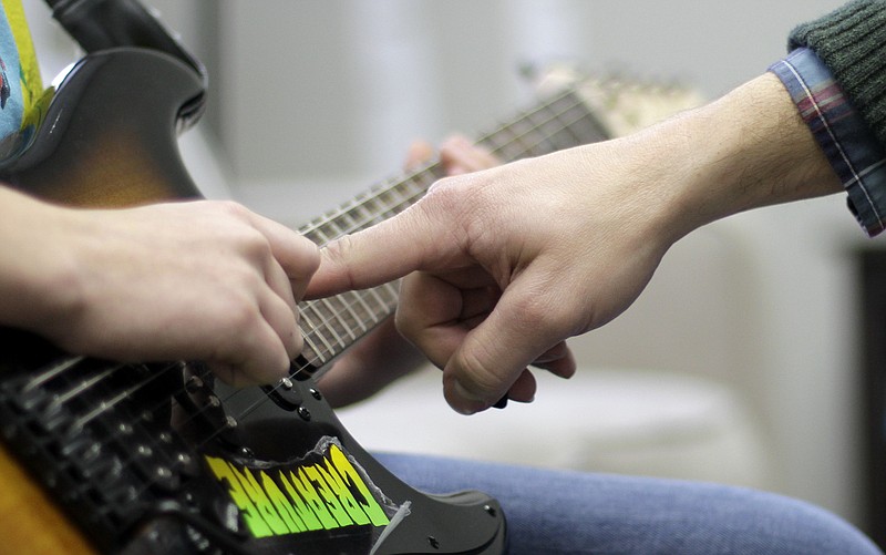 Kids can try out guitars at Songbirds Guitar Museum during Chattanooga's Spring Break Safari.