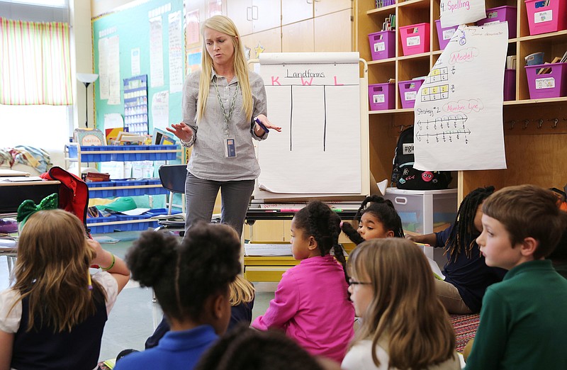 Christin Willingham talks through what students know and asks them what they want to know about landforms while student teaching in Wendy Scruggs' class at Battle Academy Wednesday, March 7, 2018 in Chattanooga, Tenn. Willingham, who is a senior in the University of Tennessee at Chattanooga's School of Education, is doing her student teaching residency in Scruggs' classroom. 