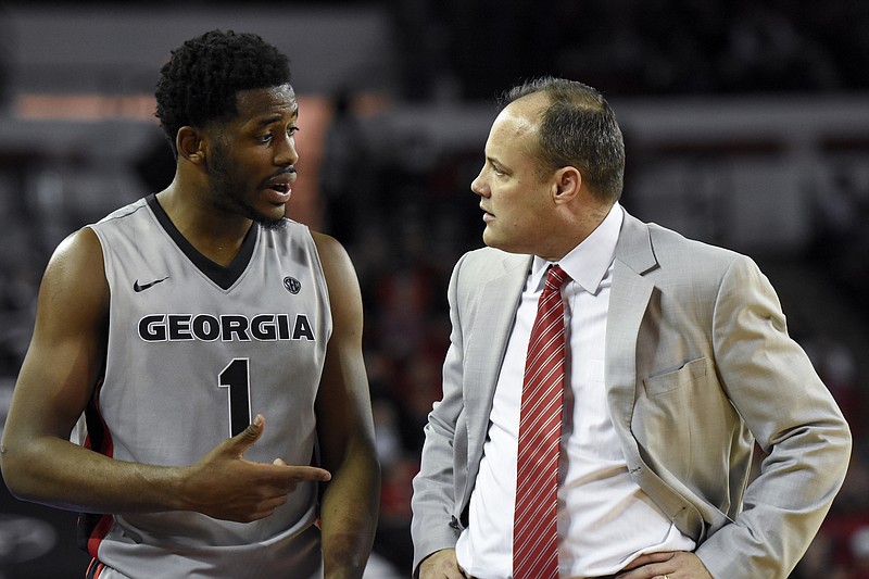 The college basketball career of Georgia senior forward Yante Maten, left, came to a close Sunday afternoon when the team voted not to compete in the NIT. Sunday's decision by players came a day after the firing of coach Mark Fox, right.