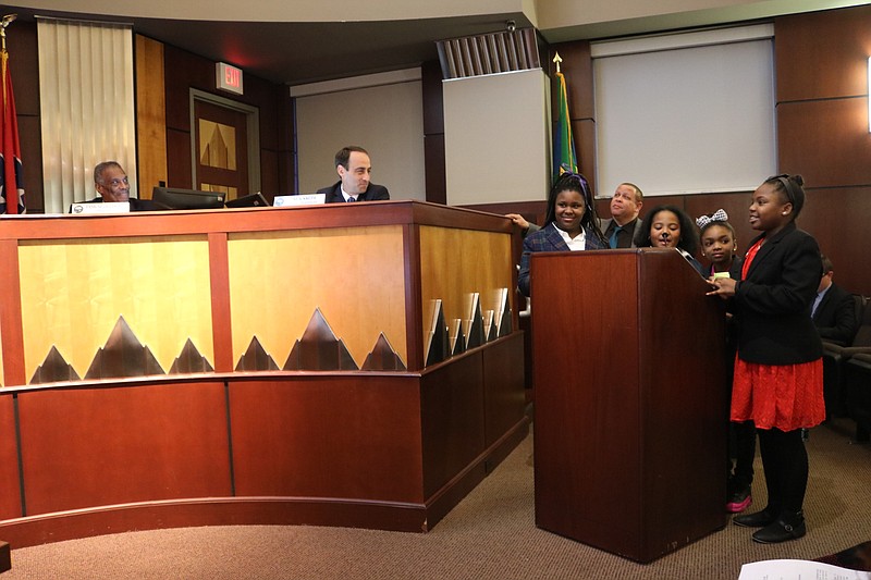 Girls Inc. participants Kezia King, Jael Jones, Jayla Watkins and MaKayla Craddock, from left, present their suggestions for the Brainerd neighborhood to the Chattanooga City Council. Brooke Satterfield, one of the local leaders with whom the girls worked, said they were nervous going in, but nerves quickly turned to excitement. "The girls realized 'The things that I say actually matter and I can make a difference,'" Satterfield said. (Contributed photo)