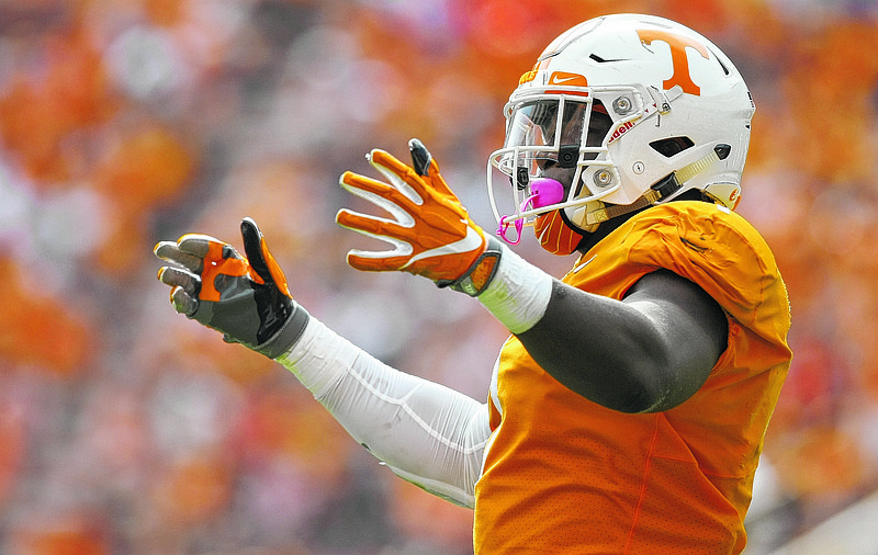 Tennessee defensive lineman Jonathan Kongbo (1) pumps the crowd up against South Carolina at Neyland Stadium on Saturday, Oct. 14, in Knoxville, Tenn.