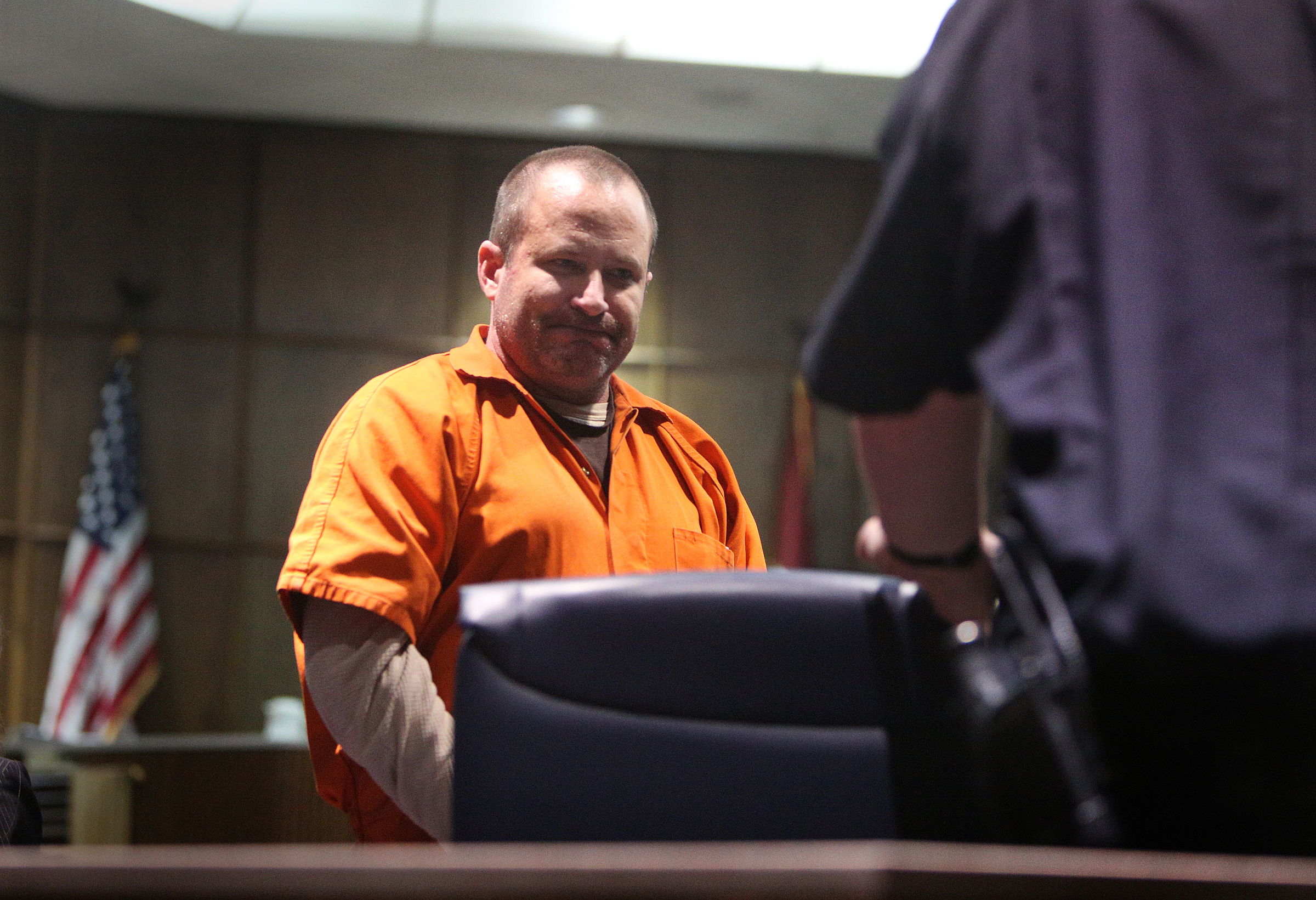 Ben Brewer leaves the courtroom in custody following his sentencing in Judge Don Poole's courtroom in Hamilton County Criminal Court Monday, March 12, 2018 in Chattanooga, Tenn. Brewer was convicted on multiple charges in the deaths of six people when his tractor-trailer crashed into their vehicles on Interstate 75 near Ooltewah in 2015.