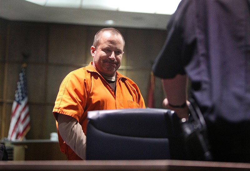 Ben Brewer leaves the courtroom in custody following his sentencing in Judge Don Poole's courtroom in Hamilton County Criminal Court Monday, March 12, 2018 in Chattanooga, Tenn. Brewer was convicted on multiple charges in the deaths of six people when his tractor-trailer crashed into their vehicles on Interstate 75 near Ooltewah in 2015.