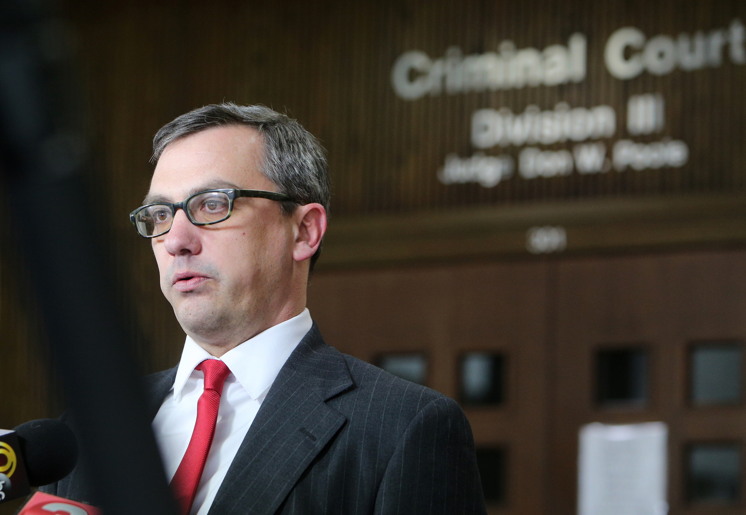 Hamilton County District Attorney Neal Pinkston speaks with media following the sentencing of Ben Brewer in Hamilton County Criminal Court outside of Judge Don Poole's courtroom Monday, March 12, 2018 in Chattanooga, Tenn. Brewer was convicted on multiple charges in the deaths of six people when his tractor-trailer crashed into their vehicles on Interstate 75 near Ooltewah in 2015.