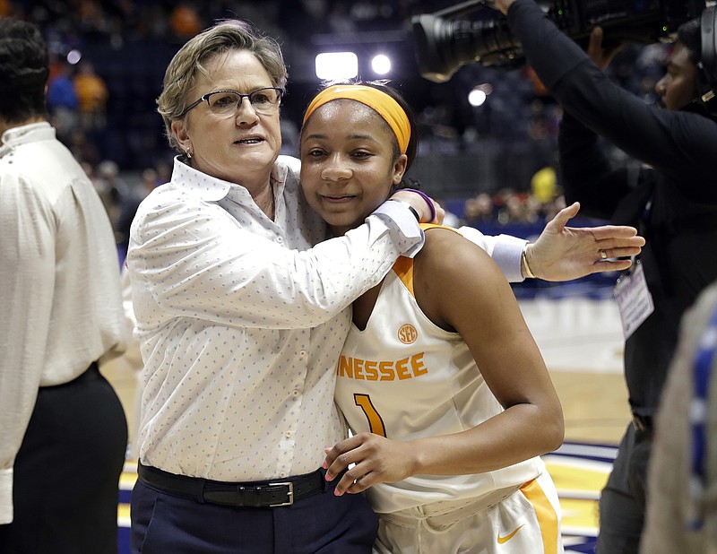 Tennessee head coach Holly Warlick, left, celebrates with guard Anastasia Hayes (1) after they defeated Auburn in an NCAA college basketball game at the women's Southeastern Conference tournament Thursday, March 1, 2018, in Nashville, Tenn. (AP Photo/Mark Humphrey)