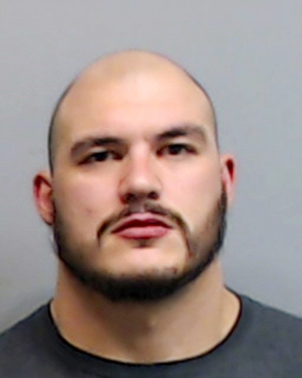 In this March 7, 2018, photo provided by the Fulton County Sheriff's Office, Denver Broncos NFL football player Adam Gotsis poses. Gotsis has been charged with rape in Atlanta. An incident report says a 30-year-old woman went to Atlanta police headquarters on Feb. 1 and told an investigator Gotsis had raped her on March 9, 2013. The Broncos said in a statement Monday, March 12, 2018, that they were aware of allegations of an incident that allegedly happened when Gotsis was in college. (Fulton County Sheriff's Office via AP)

