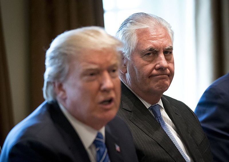 FILE — Secretary of State Rex Tillerson, right, listens last September as President Donald Trump speaks during a meeting with Malaysian Prime Minister Najib Razak in the Cabinet Room of the White House. Trump announced via Twitter on Tuesday that Mike Pompeo, now the CIA director, will become secretary of state, replacing the ousted Tillerson. (Doug Mills/The New York Times)