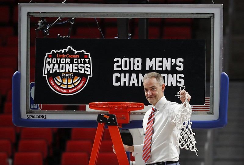 Wright State men's basketball coach Scott Nagy celebrates the Raiders' 74-57 win against Cleveland State in the Horizon League tournament final this month in Detroit. Wright State faces Tennessee today in an NCAA tournament opener in Dallas.