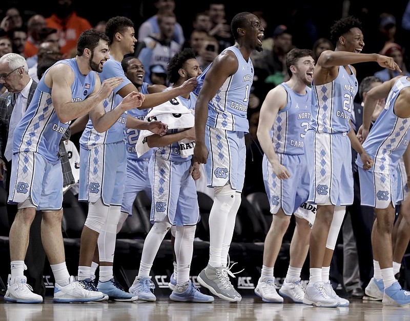 Virginia won the ACC men's basketball tournament last weekend, but league runner-up North Carolina, pictured, brings the coaching skill of Roy Williams, the talent of senior point guard Joel Berry II and the experience of playing in the past two NCAA tournament finals — and winning it all last season. The NCAA tournament starts in earnest today with 16 games around the country.