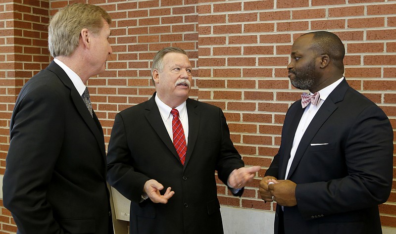 University of Tennessee at Chattanooga Chancellor Steven Angle, left, Hamilton County Mayor Jim Coppinger  and Superintendent Bryan Johnson mingle after a press conference announcing the launch of the Future Ready Institutes at Howard School on Thursday, March 15, 2018 in Chattanooga, Tenn. The 11 Hamilton County schools to have a Future Ready Institute are: Brainerd High, East Hamilton Middle/High, East Ridge High, Hixson High, Howard High, Ooltewah High, Red Bank High, Sequoyah High, Tyner High, Signal Mountain Middle/High and Soddy-Daisy High.