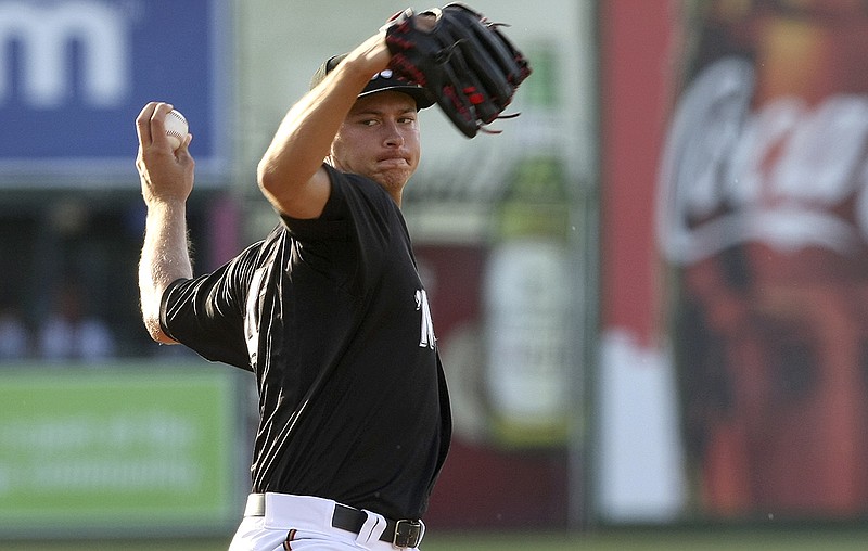 Stephen Gonsalves pitches for the Chattanooga Lookouts during a game against the Jacksonville Jumbo Shrimp last July at AT&T Field. Starting this season, a 15-second pitch clock will be used by minor league teams at the Class AAA and AA levels.