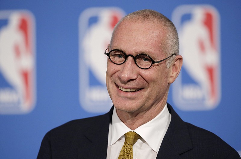 FILE - In this Oct. 6, 2014, file photo, ESPN President John Skipper smiles during a news conference in New York. 