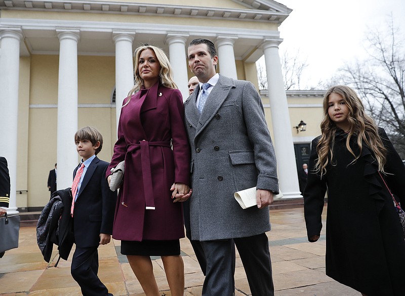 In this Jan. 20, 2017 file photo, Donald Trump Jr., wife Vanessa Trump, and their children Donald Trump III, left, and Kai Trump, right, walk out together after attending church service at St. John's Episcopal Church across from the White House in Washington. A public court record filed Thursday, March 15, 2018, in New York says Vanessa Trump is seeking an uncontested divorce from the president's son. Details of the divorce complaint haven't been made public. (AP Photo/Pablo Martinez Monsivais, File)