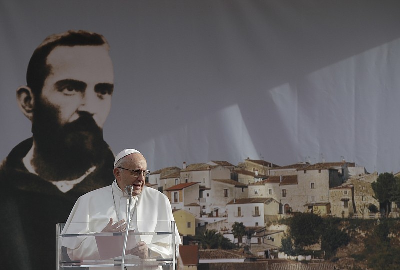 
              Pope Francis delivers his speech in Pietrelcina, Italy, the birthplace of St. Padre Pio, Saturday, March 17, 2018. Saint Pio who is widely venerated in Italy and abroad is famous for bearing the stigmata, the wounds of crucified Jesus.  (AP Photo/Alessandra Tarantino)
            