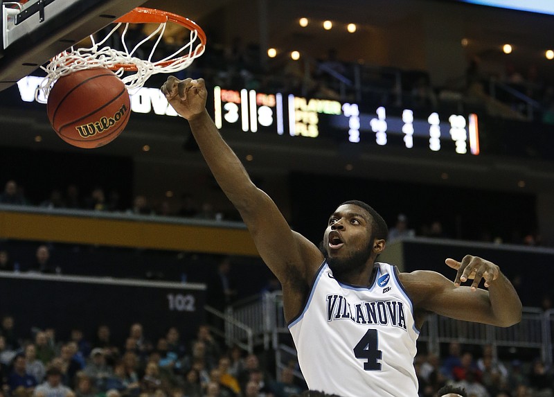 Villanova's Eric Paschall dunks during the top-seeded Wildcats' 81-58 win against Alabama in an NCAA tournament second-round game Saturday in Pittsburgh. They move on to the East Region semifinals this week in Boston.