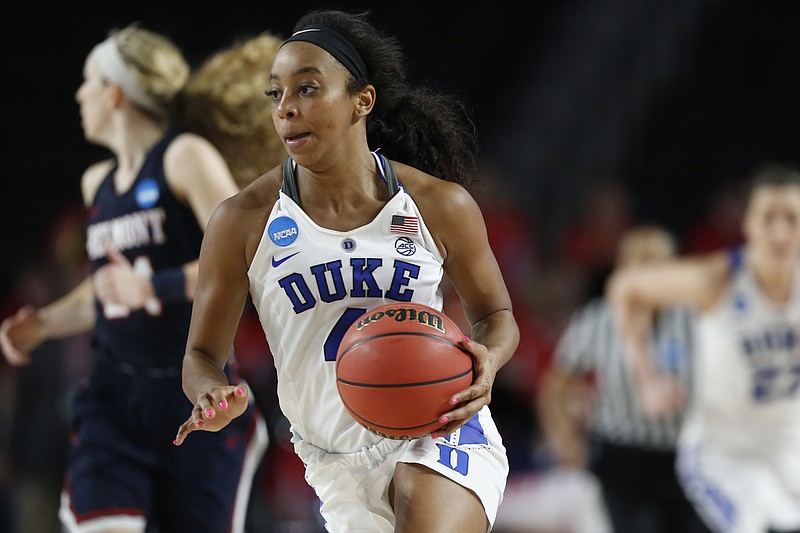 Duke guard Lexie Brown moves the ball down the court against Belmont during the second half of a first-round game in the NCAA women's college basketball tournament in Athens, Ga., Saturday, March. 17, 2018. Duke won 72-58. (AP Photo/Joshua L. Jones)