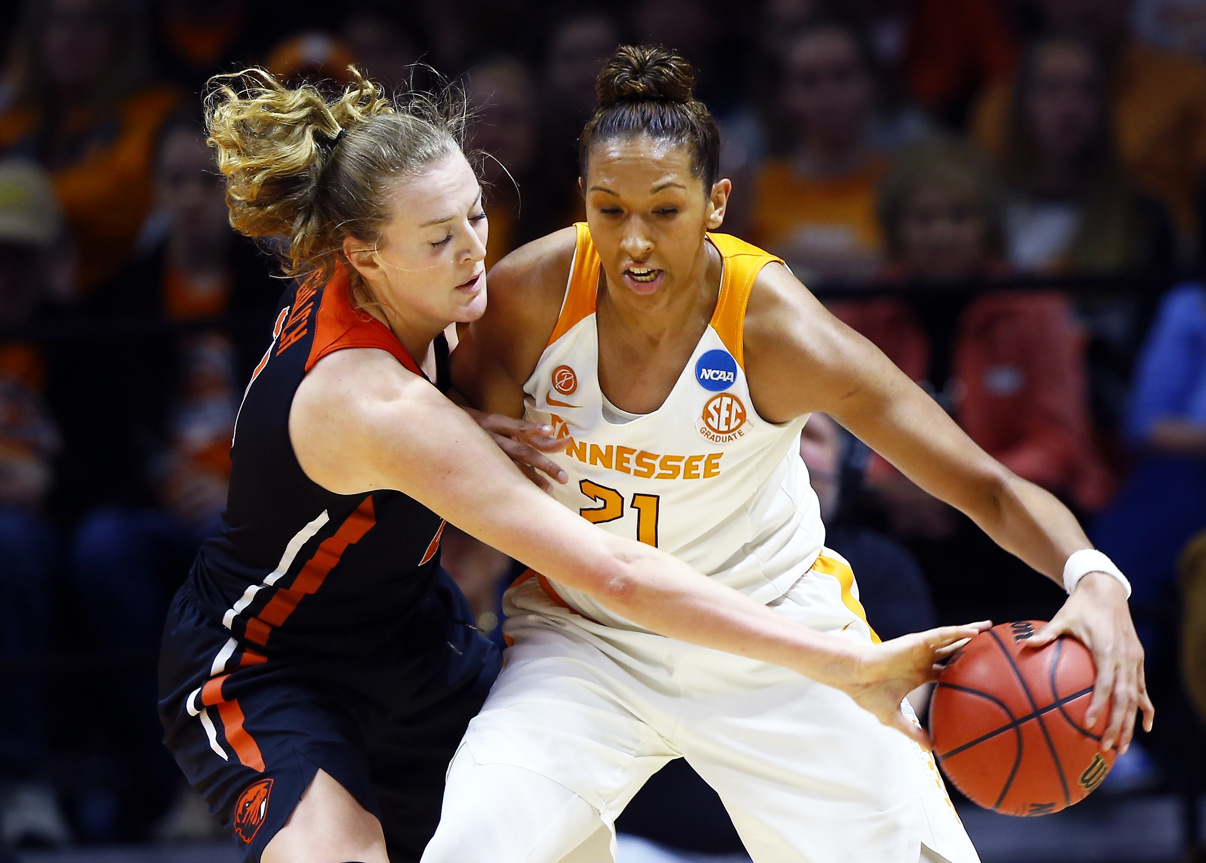 Oregon State center Marie Gulich, left, knocks the ball away Tennessee center Mercedes Russell, right, in the first half of a second-round game in the NCAA college basketball tournament Sunday, March 18, 2018, in Knoxville, Tenn. (AP Photo/Wade Payne)