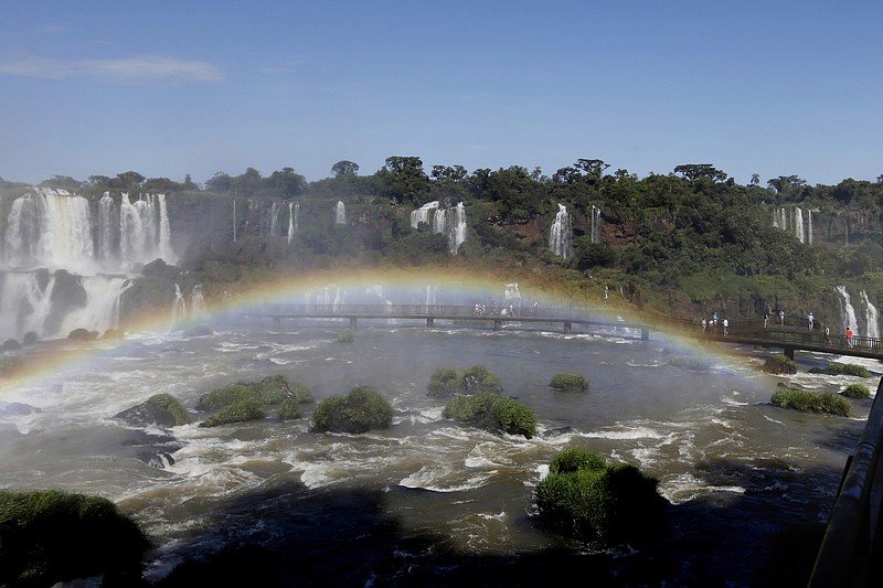 FILE - This March 15, 2015 file photo shows a rainbow at Iguazu Falls from the Brazilian side in Foz do Iguazu, Brazil.