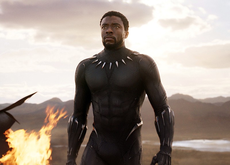 This file image released by Disney and Marvel Studios' shows Chadwick Boseman in a scene from "Black Panther." "Black Panther" has become the first film since 2000's "Avatar" to top the weekend box office five straight weekends. According to studio estimates Sunday, March 18, 2018, "Black Panther" grossed $27 million in ticket sales over the weekend, pushing its domestic haul to $605.4 million. (Marvel Studios/Disney via AP, File)