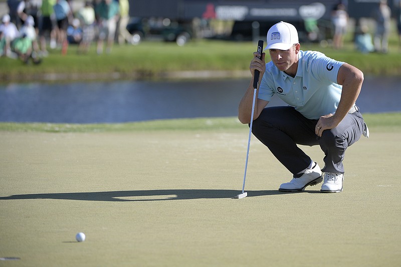 Former Baylor School and Vanderbilt University golfer Luke List lines up a putt on the 17th green during the third round of last weekend's Arnold Palmer Invitational tournament in Orlando.